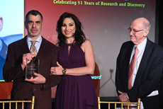 Dr. Mitchell Katz receives The Public Health & Service Award fromValerie Smaldone and Dr. Franco Muggia looks on